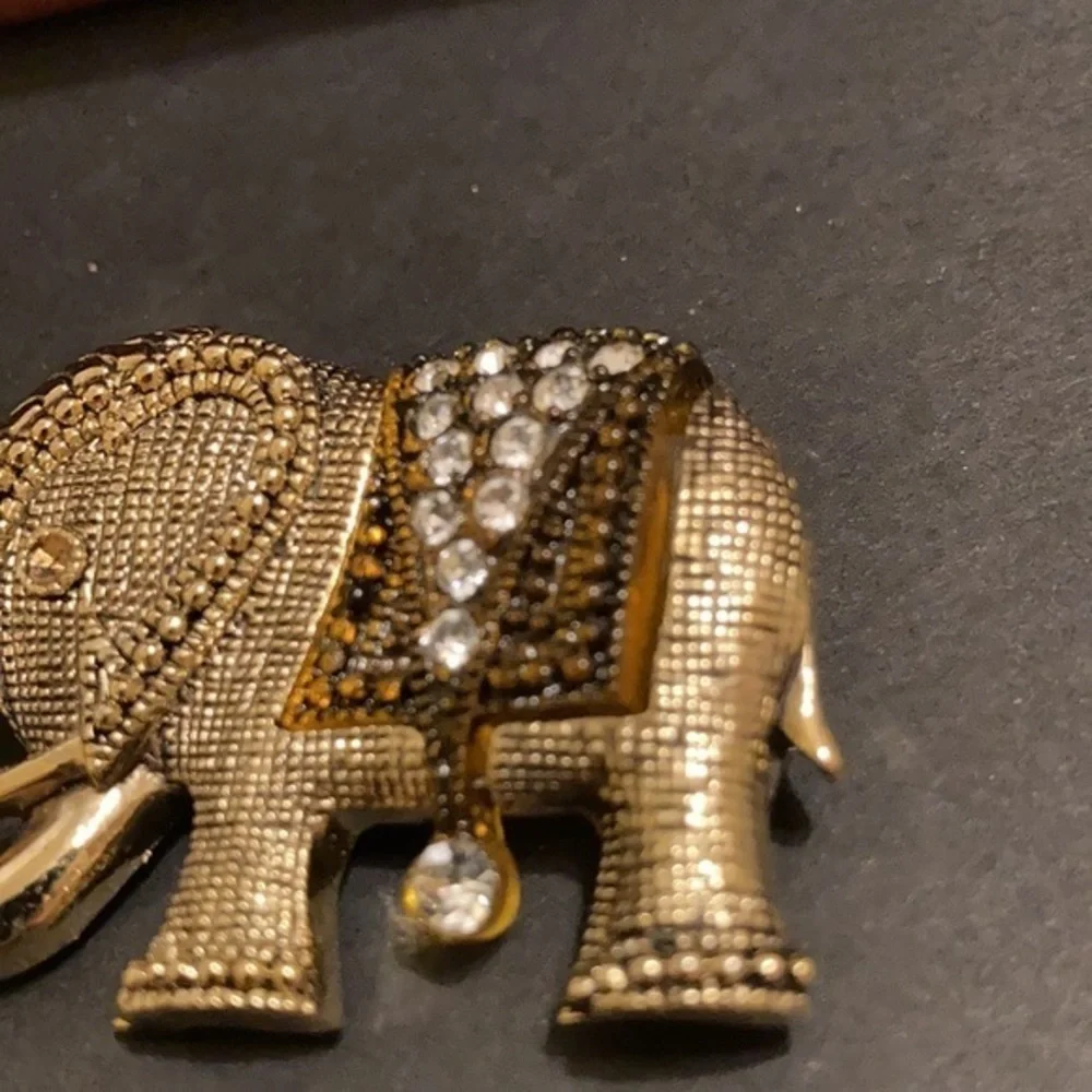 Gorgeous gold tone and crystal elephant brooch